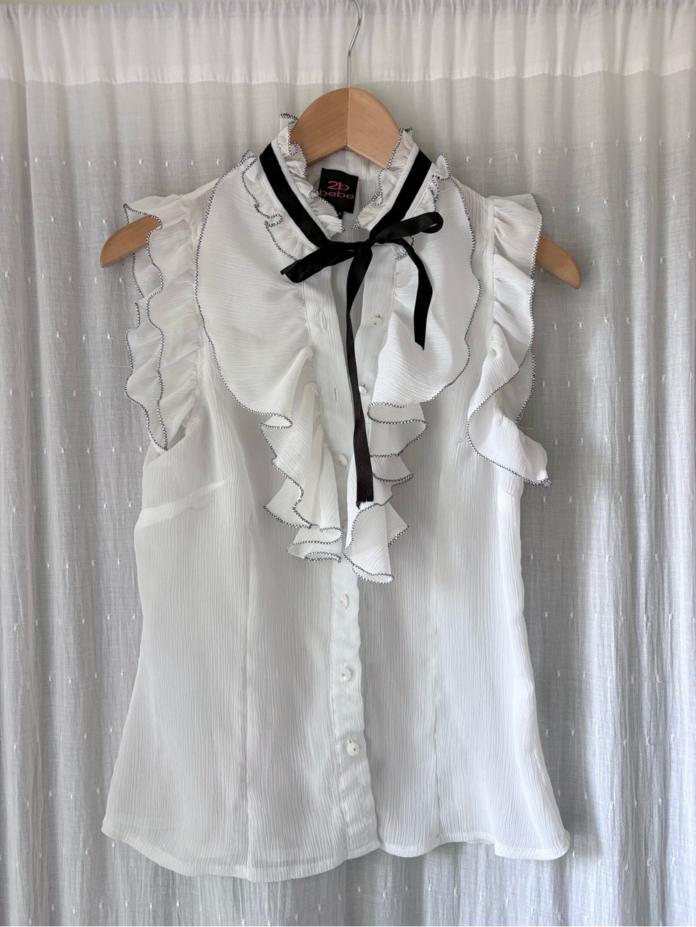 Vintage bebe White Sleeveless Ruffle Blouse with Black Ribbon Tie